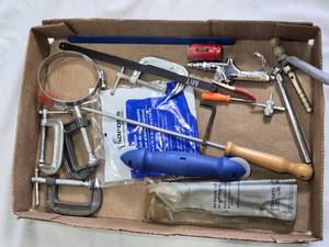 Box of Various Hand Tools and Accessories including Clamps, Saws, and Drill Bits