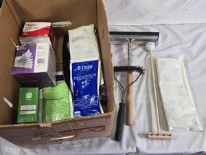 Box of Medical and Cleaning Supplies including BCool Gel Packs, Gauze Pads, and Squeegee, Wire Brush, and Others