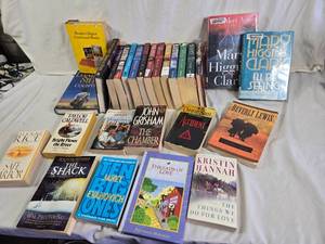 Collection of Books Including Mary Higgins Clark and John Grisham
