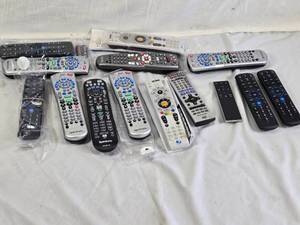Lot of Remote Controls including Spectrum, DirecTV, Panasonic, and Xfinity