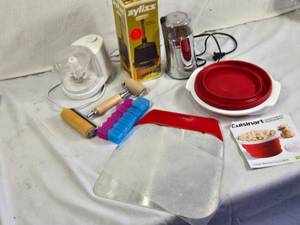 Various Kitchen Tools and Small Appliances including Zyliss Blitzhacker Food Chopper, Cuisinart Microwave Popcorn Maker, and Other Accessories