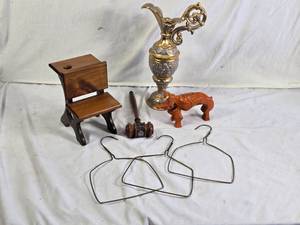 AntiqueVintage Decorative and Household Items including Ornate Pitcher, Wooden Gavel, Elephant Figurine, and Wire Hangers