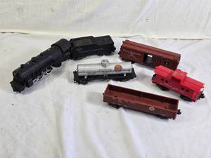 American Flyer Model Train Set including Engine, Tank Car, Boxcar, and Caboose