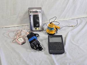 Wireless Mobile Charger, Sony Remote Commander, and Other Electronics Assortment