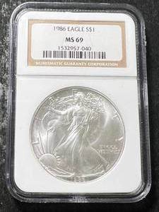 1986 AMERICAN SILVER EAGLE NGC MS69