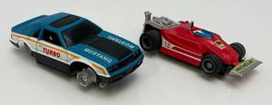 1979 TYCO Ford Mustang H.O. Slot Car & TYCO Michelin H.O. Slot Car #12 (Both Need Work Missing parts)