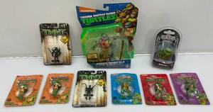 Misc. Collectible TMNT Items Including Miniature Keychains, Action Figure And More (All New Old Stock)