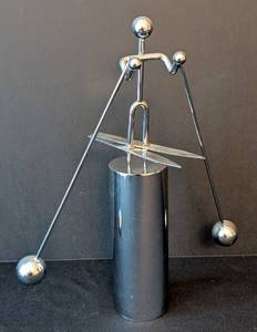 LB - Kinetic Metal Figurine Sculpture