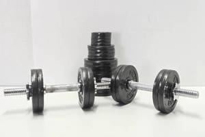 Set of Dumbbells wLOTS of Extra Pro Iron Weight Plates