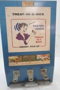 Vintage Treat-In-A-Box coin-operated vending machine