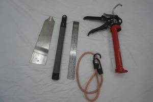 Hand Tools. Vaughan Bear Saw, Calking Gun, Stainless Steel Ruler
