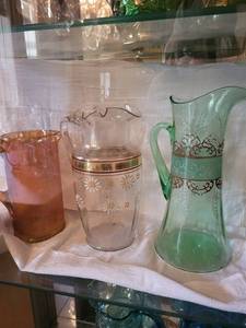 Three Glass Pitchers with Floral and Scroll Patterns (Lot of 3)