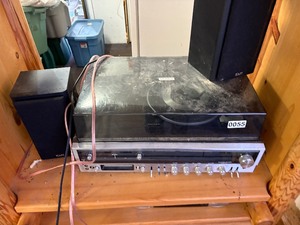 8-track and record player with 8 track tapes