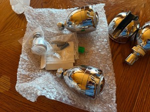 New, unused shower heads