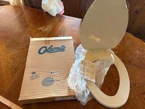 New in box toilet seat