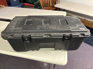 Hard plastic Plano tub with latching lid