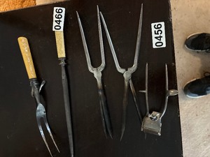 Vintage hair curlers and blade sharpener