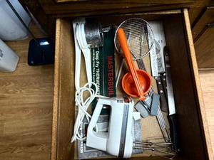 Hand mixer with Contents of cupboard