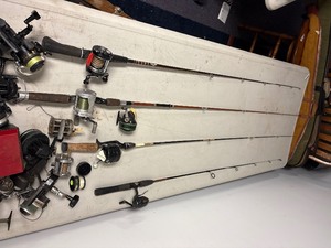 Lot of reels and rods