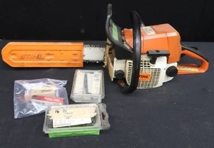 STIHL 021 CHAINSAW WITH CHAINS AND SPARK PLUGS