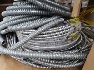 3 DIFFERENT SIZES OF CLAD CABLE (ELECTRICAL CONDUIT) AND YELLOW WIRES