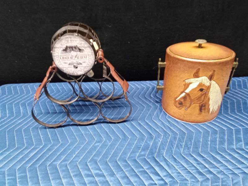 Wine rack with corks and 1950s or 1960s equestrian themed ice bucket