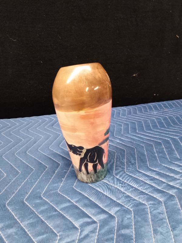 Heavy (feels like stone) vase made in Kenya with elephant design