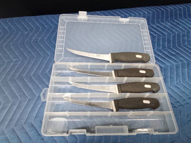 4 Kaicut fillet knives in a plastic tackle organizer