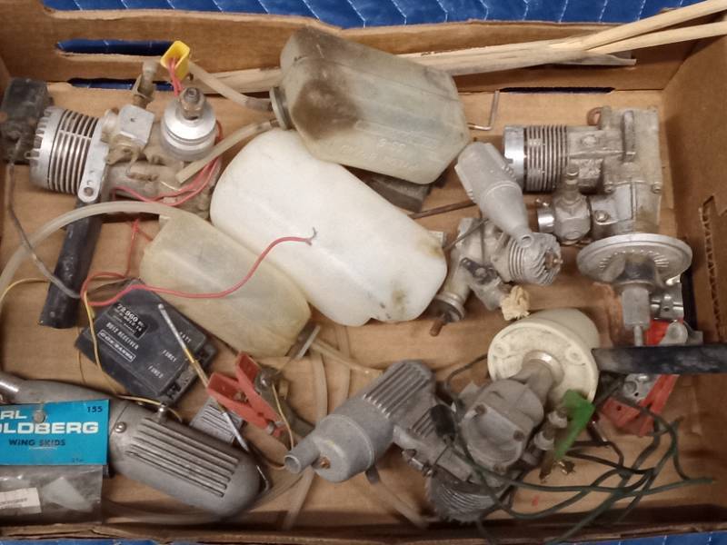 Flat of model airplane motors and parts