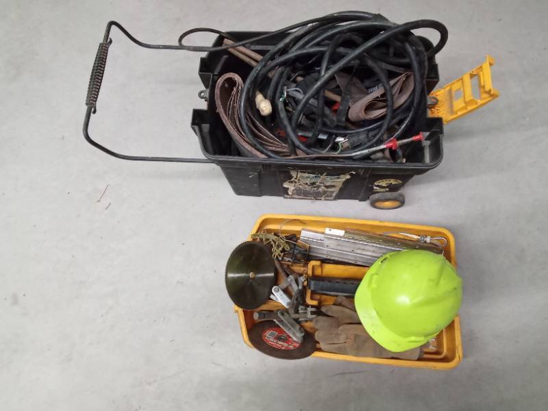 toolbox on wheels full of sanding belts, rubber belts, heavy duty electrical with plug in, saw blade, cut off saw blades and more