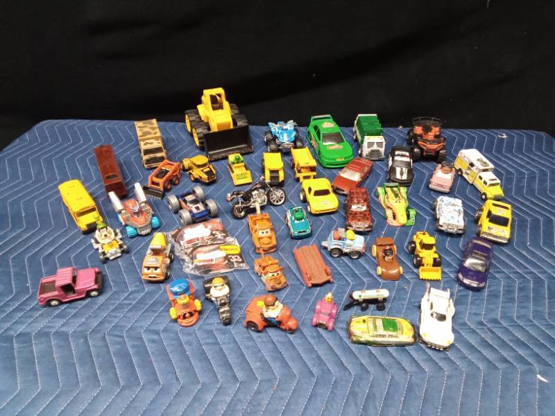 Lot of toy cars, trucks, tractors, bus, RTVs, and more