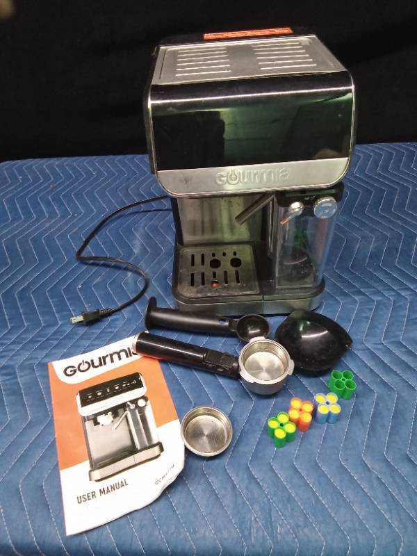 Gourmia automatic expresso maker with all the accessories and manual