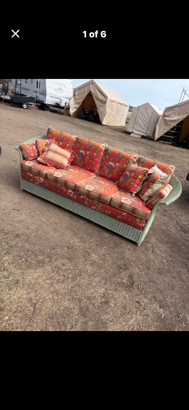 Wicker sofa with cushions