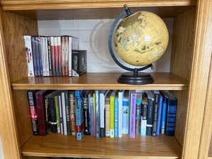 Globe on Stand with Assorted Books & DVDs - Wooden Shelf Display