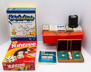 Variety of Board Games and Decks of Cards