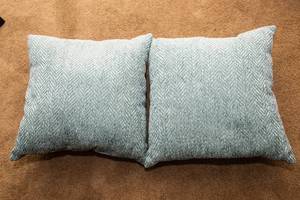 Two Light Teal Throw Pillows