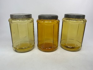 Three Antique Amber Glass Tobacco Jars