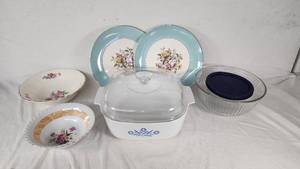 Vintage Kitchenware Including CorningWare Casserole, Pyrex Bowl, and Floral Dishware