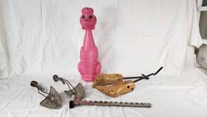Plastic Pink Poodle, Wooden Shoe Stretchers, and Metal Shoe Stretchers