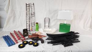Vintage Toy and Model Train Accessories including Track, Ladders, and Vehicles