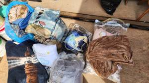 Assorted Home Textiles including Pillows, Blankets, and Linens