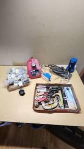 Assorted Tools and Hardware Items including Pipe Cutters, Clamps, Caster Wheels, and Gas Container