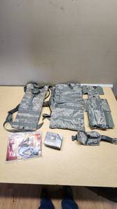 Military Tactical Gear and Ammunition Lot including Remington Premier Magnum 10 Gauge Ammo, Tactical Vest, Hydration Pack, and Accessories
