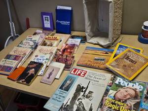 Collection of Books and Magazines including National Geographic and How to Talk Minnesotan