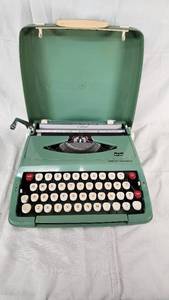 Smith-Corona Portable Typewriter with Case