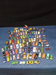 Over 100 toy cars, motorcycles, trucks and more