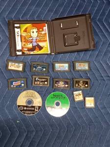 8 DS game cartridges and 2 Nintendo Game boy discs and 1 empty case
