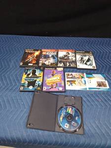 4 Play Station 2 games (1 in wrong case) and 4 empty cases