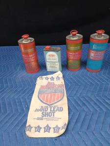 Cans of Hercules gun powder and All American hard lead shot bag