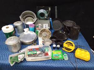 Camp cooking supplies including a small Colemans propane stove